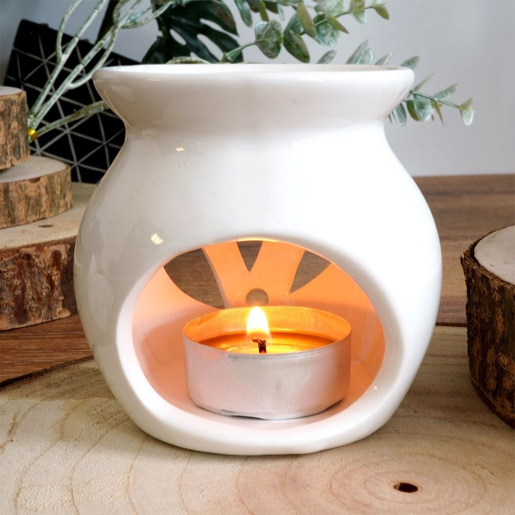 Scent diffuser in white ceramic with 12 scents and tealight candle