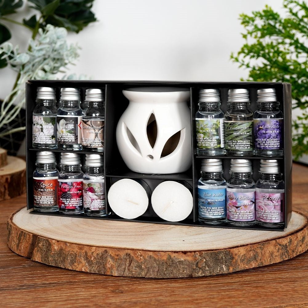 Scent diffuser in white ceramic with 12 scents and tealight candle