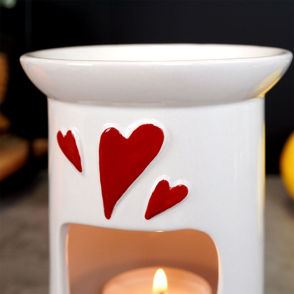 Scent diffuser in white ceramic with red hearts for wax and oils