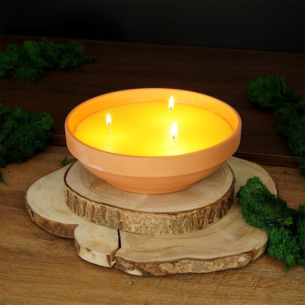 Scented candles with lemon oil for a refreshing and cozy atmosphere