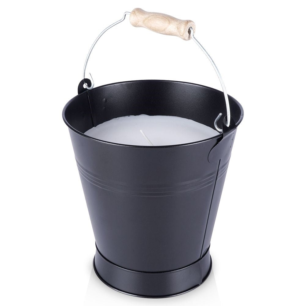Scented candle with fresh lemon oil for a cozy atmosphere