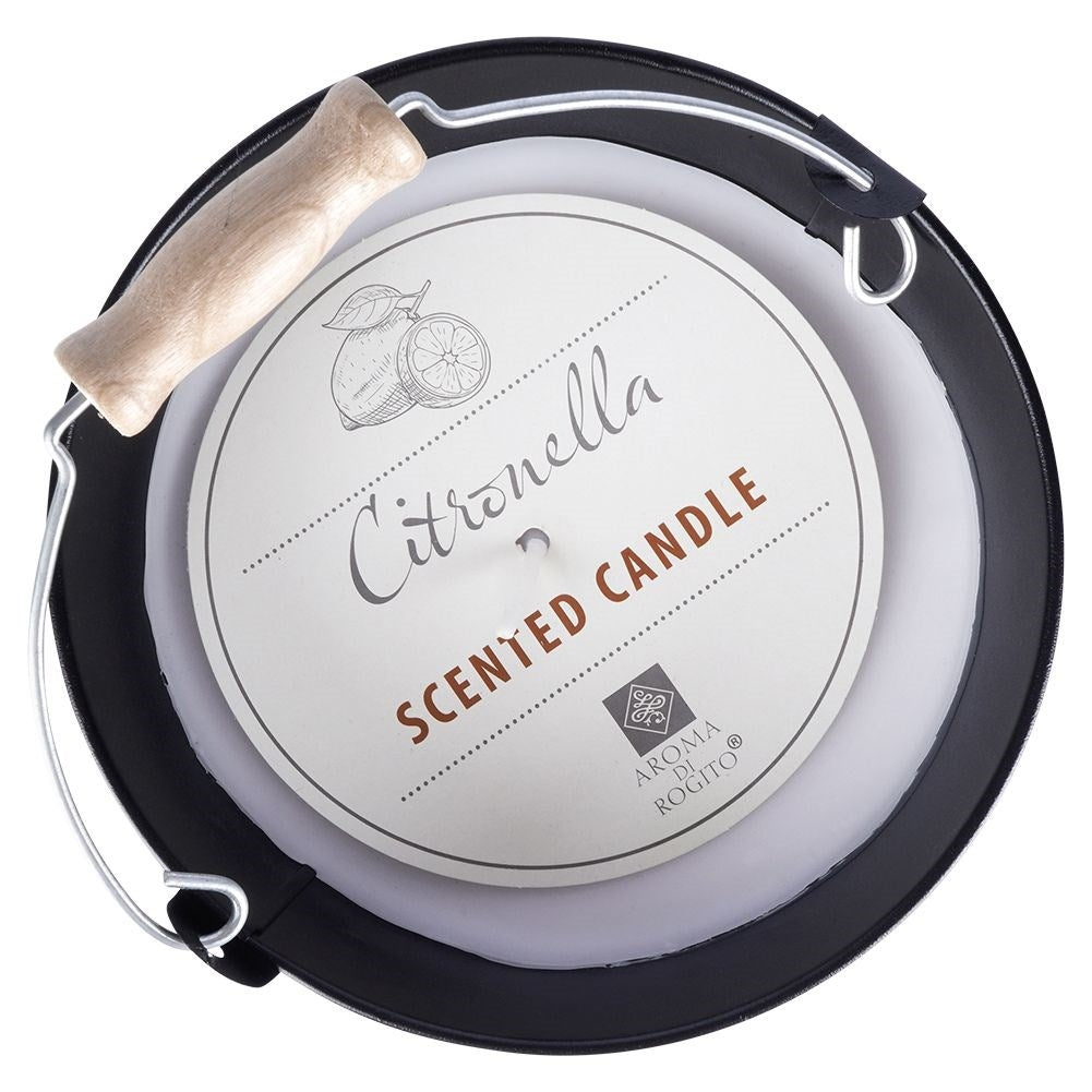 Scented candle with fresh lemon oil for a cozy atmosphere