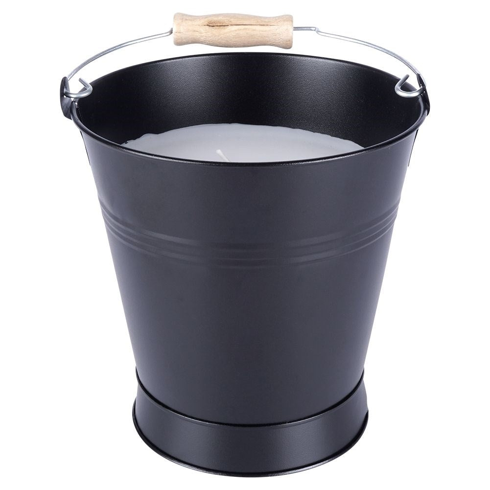 Scented candle with fresh lemon oil for a cozy atmosphere