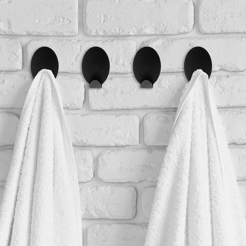 Self-adhesive oval hooks in black matt stainless steel, 4-pack