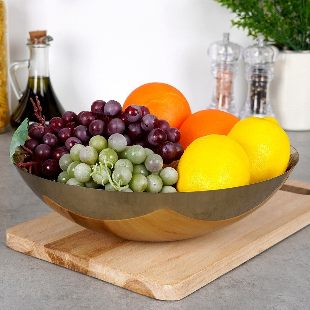 Serving bowl in stainless steel with golden color