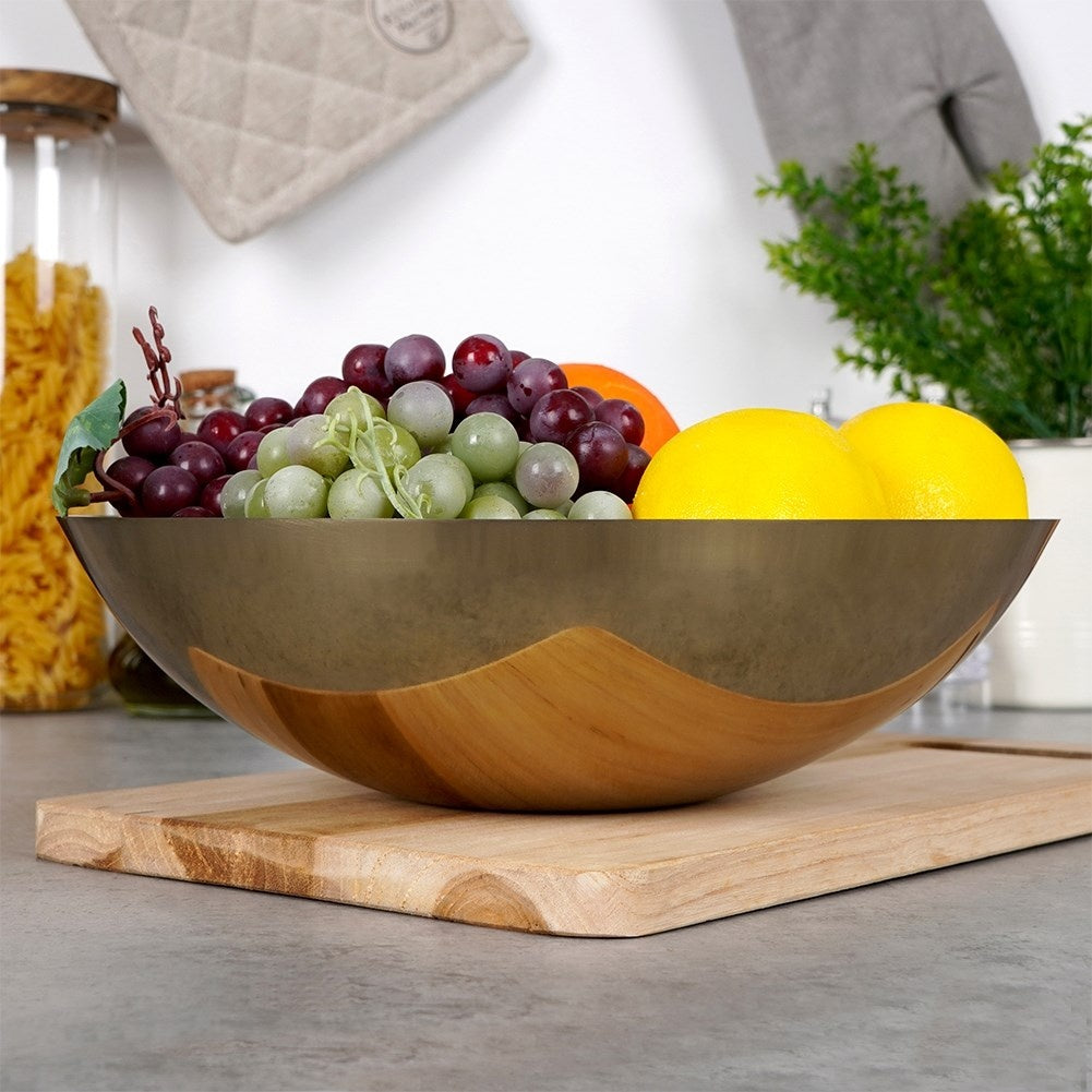 Serving bowl in stainless steel with golden color