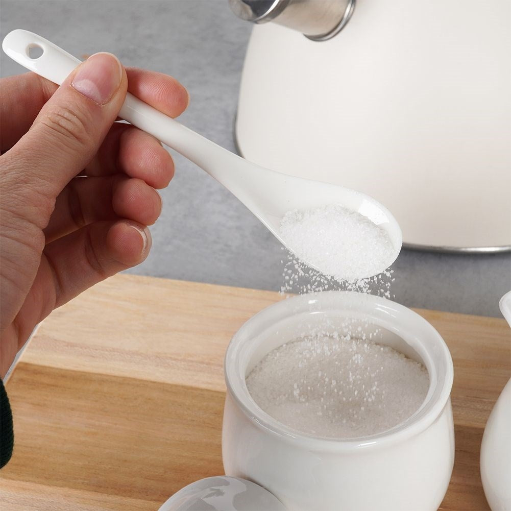Set for serving sugar and milk in white porcelain