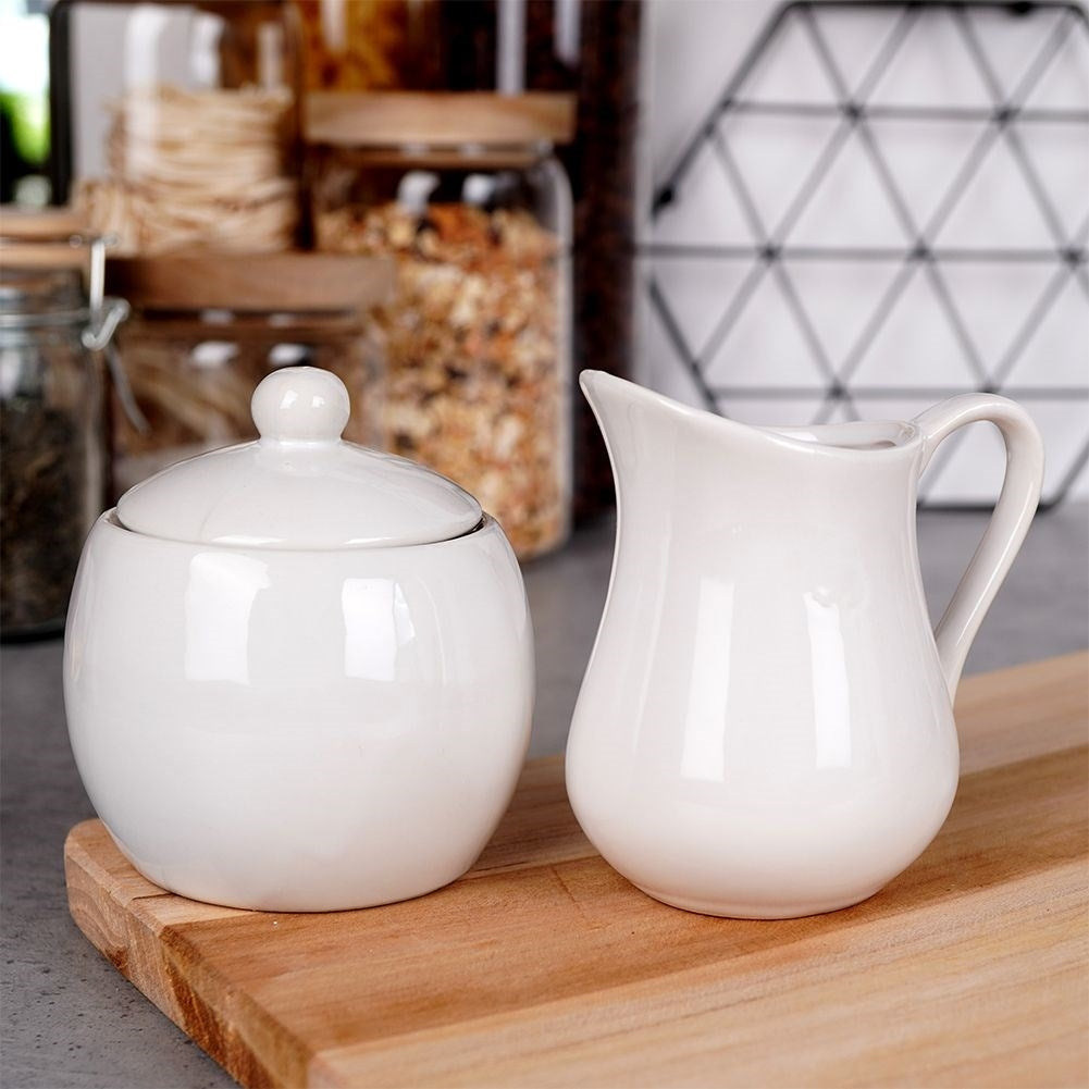 Set for sugar and milk in white porcelain, bowl and jug