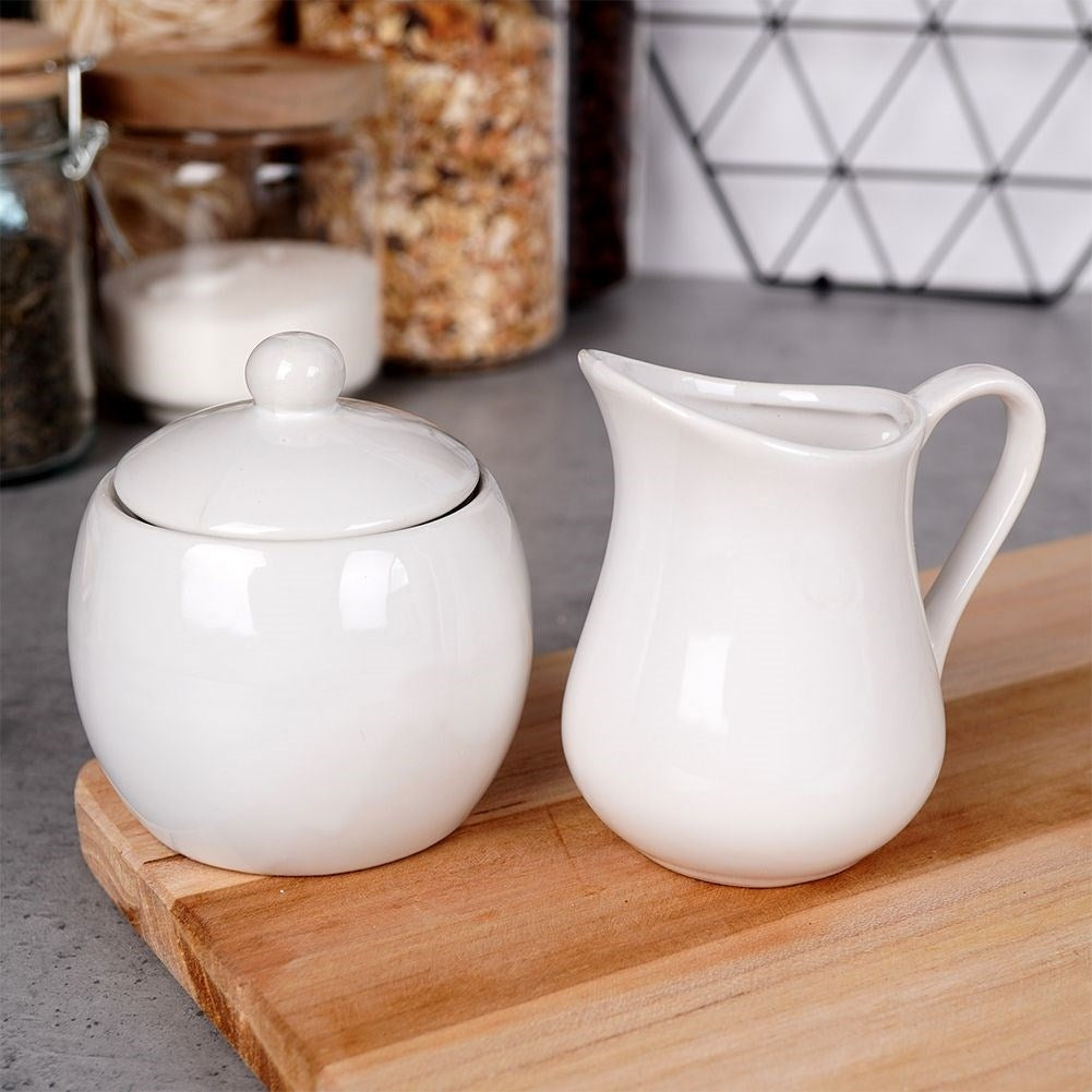 Set for sugar and milk in white porcelain, bowl and jug