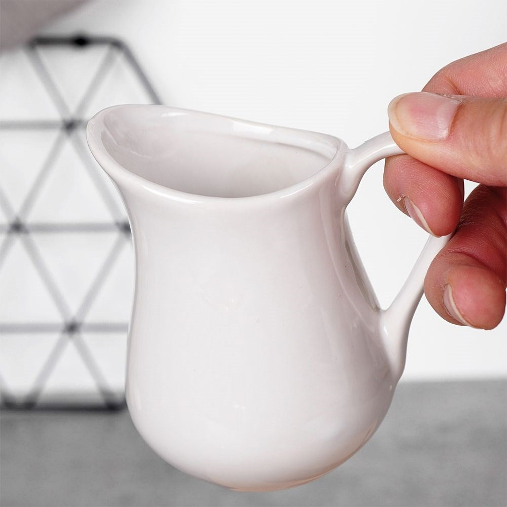 Set for sugar and milk in white porcelain, bowl and jug