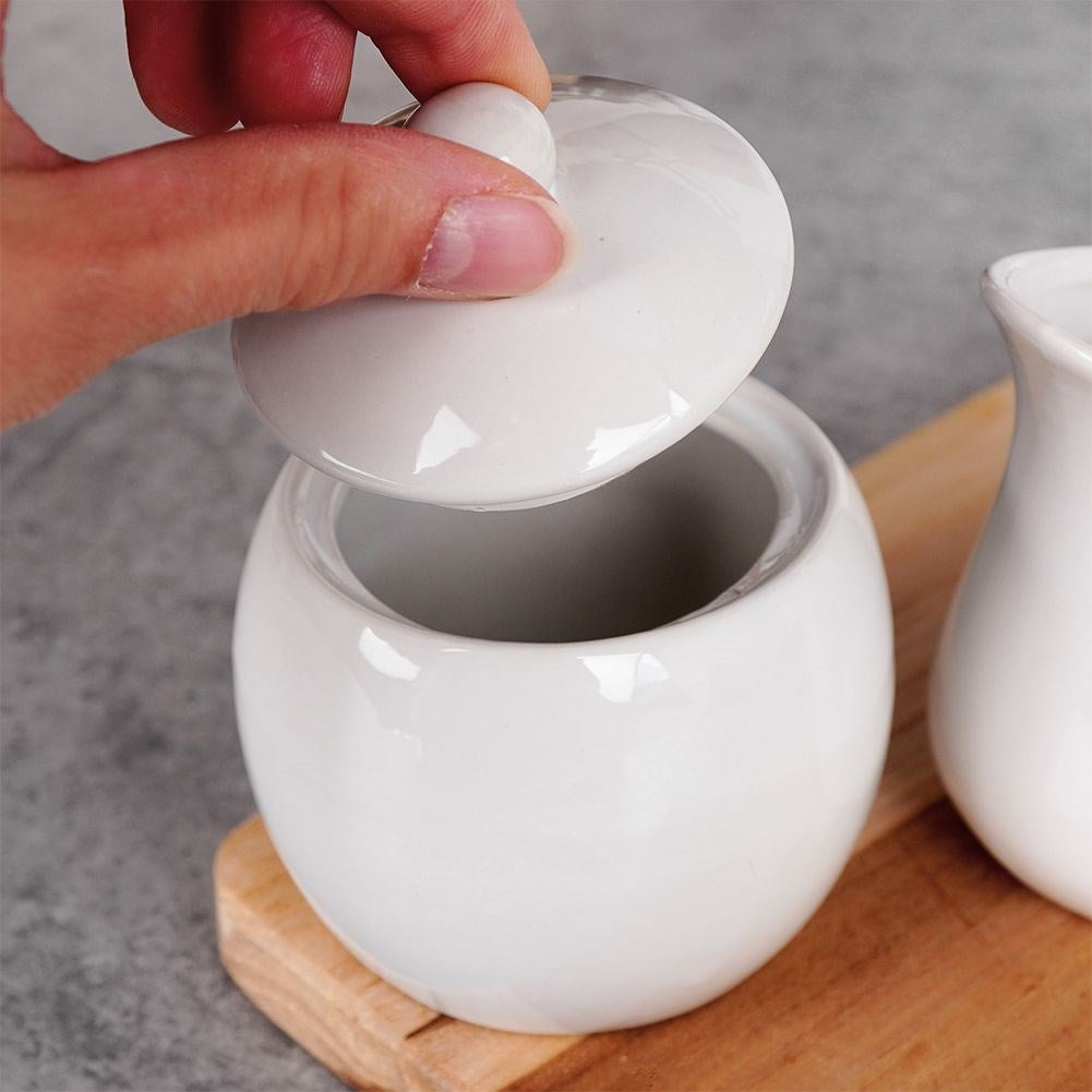 Set for sugar and milk in white porcelain, bowl and jug