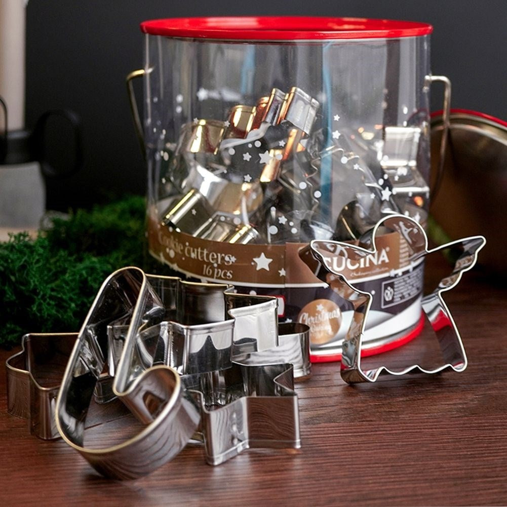 Set of 16 stainless steel Christmas cookie tins with storage