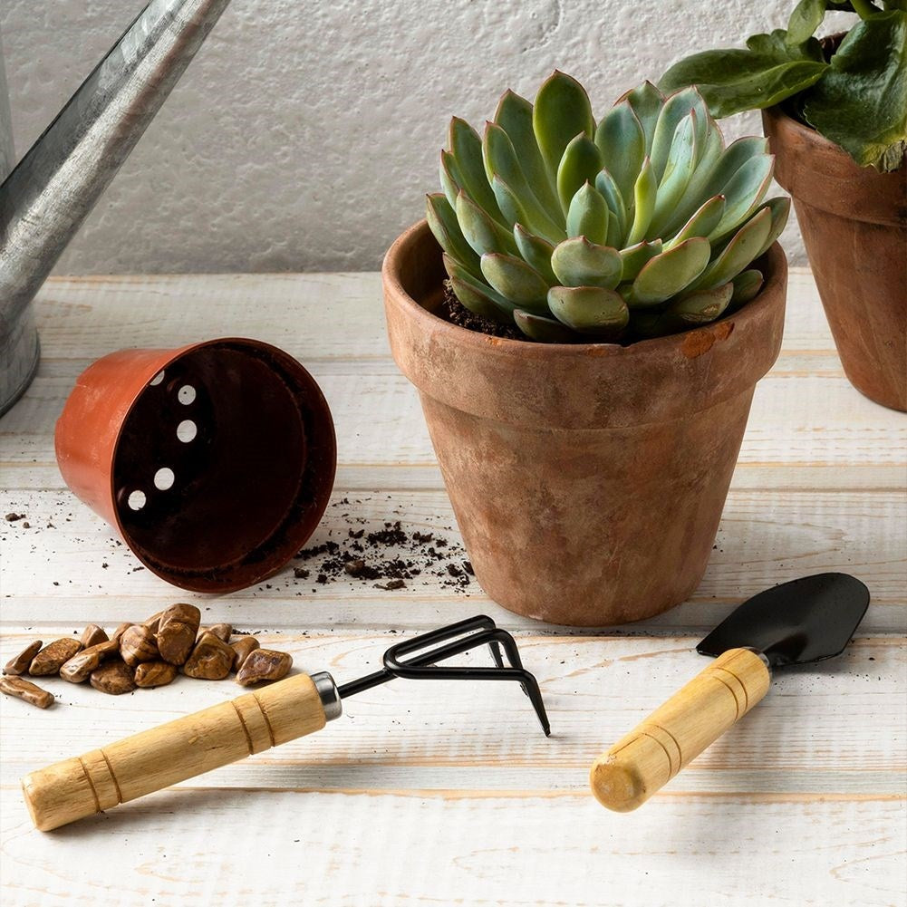 Set of 2 small metal garden tools with floral pattern