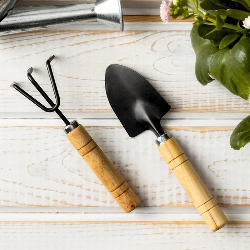 Set of 2 small metal garden tools with floral pattern