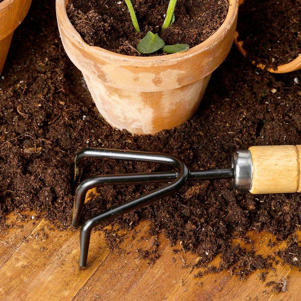 Set of 2 small metal garden tools with floral pattern