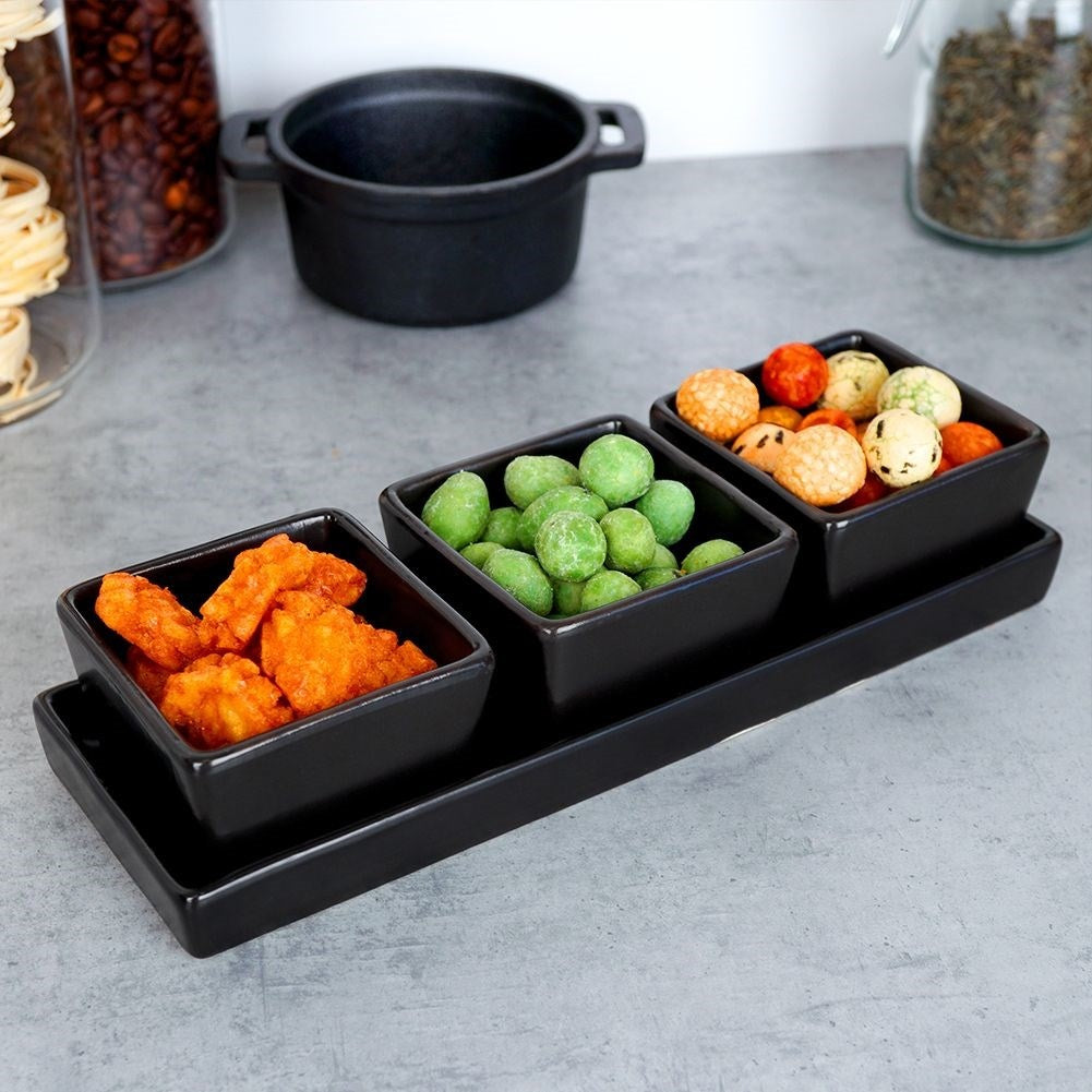 Set of 3 black ceramic bowls on tray for serving