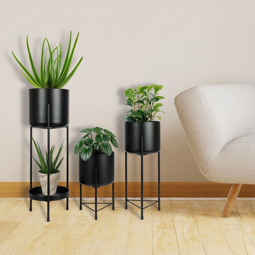 Set of 3 black flower pots on a stand for elegance