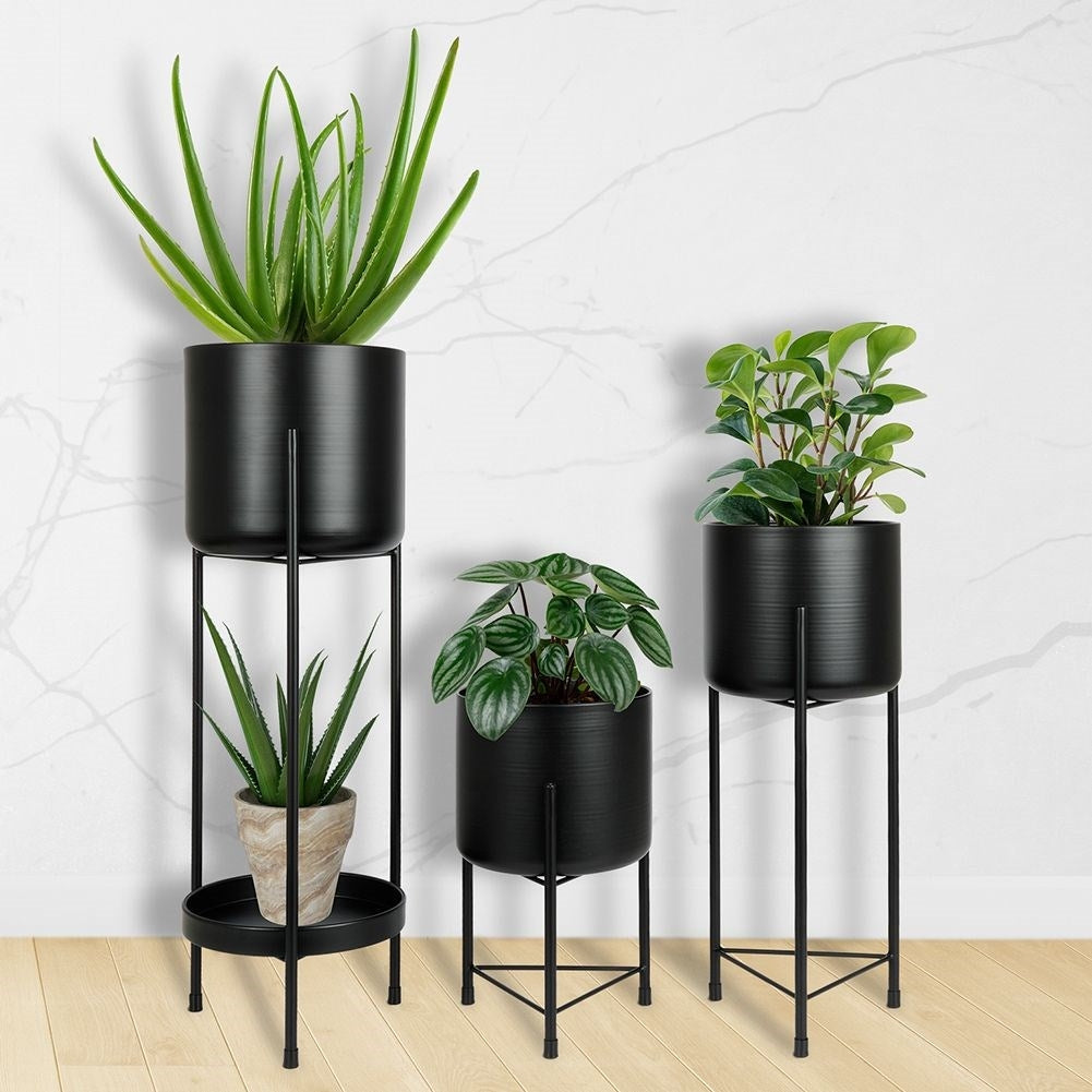 Set of 3 black flower pots on a stand for elegance