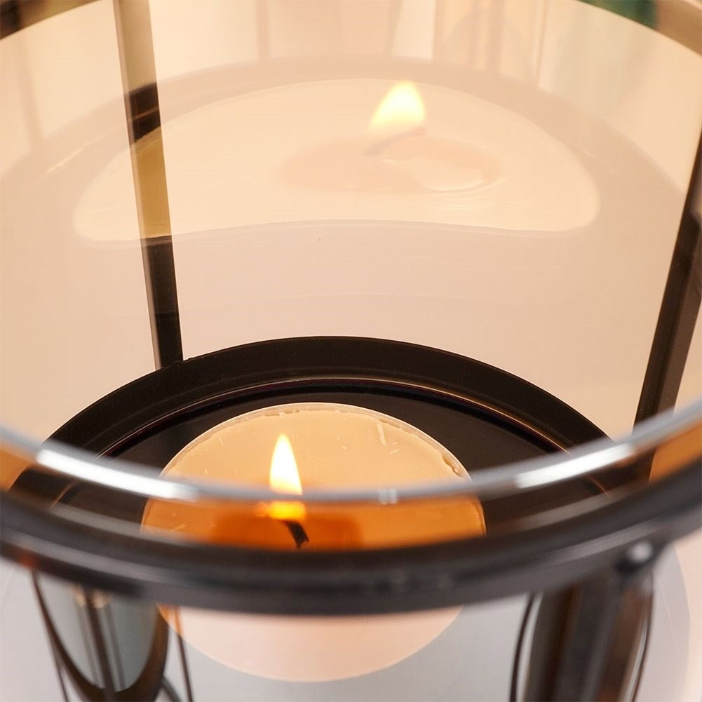 Set of 3 black metal candlesticks for tealights and regular candles