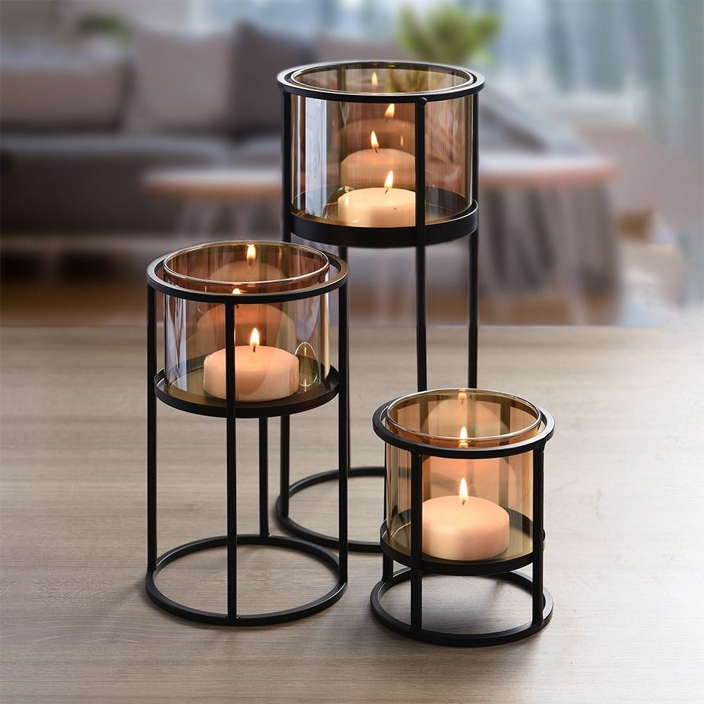 Set of 3 black metal candlesticks for tealights and regular candles