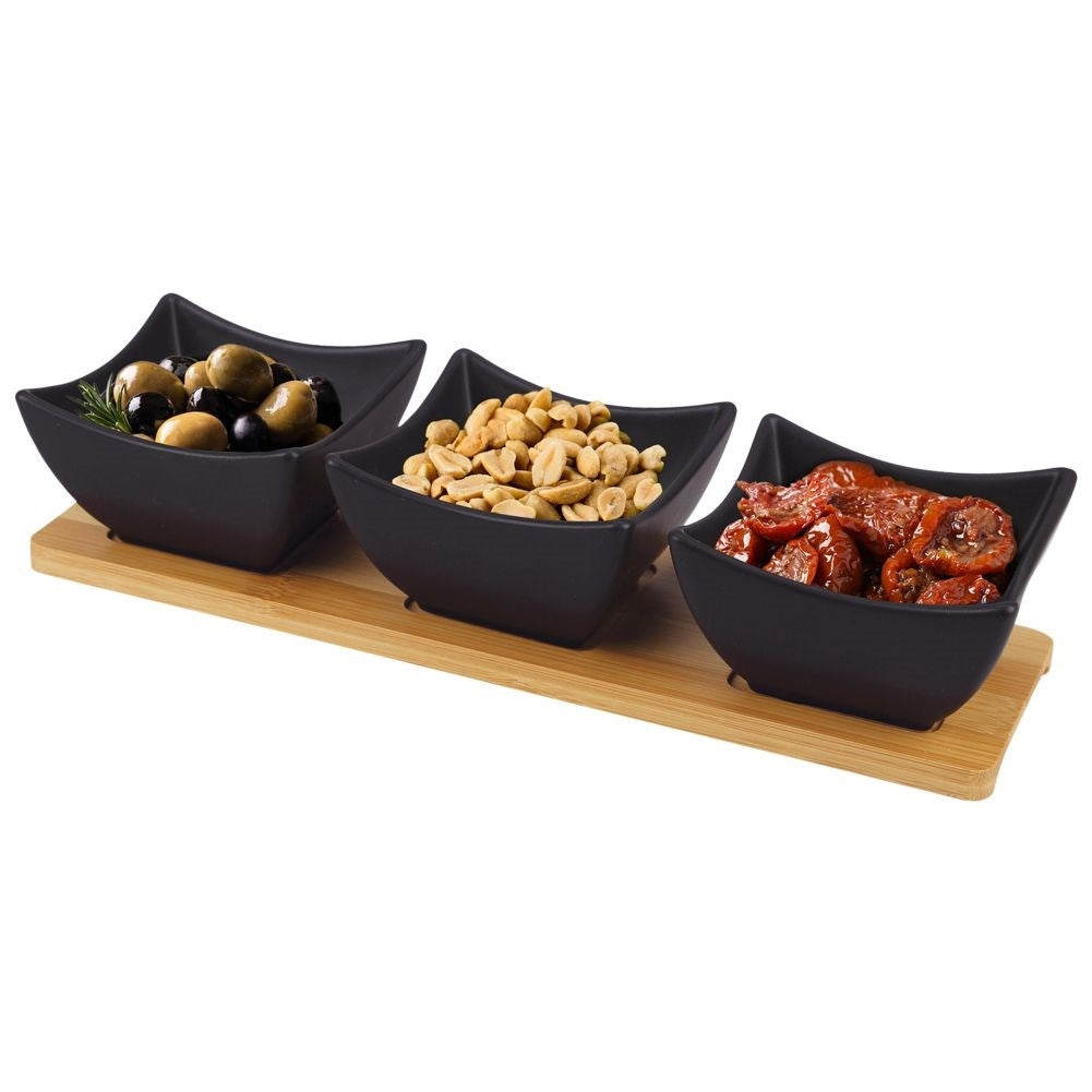Set of 3 black porcelain bowls on bamboo tray for serving