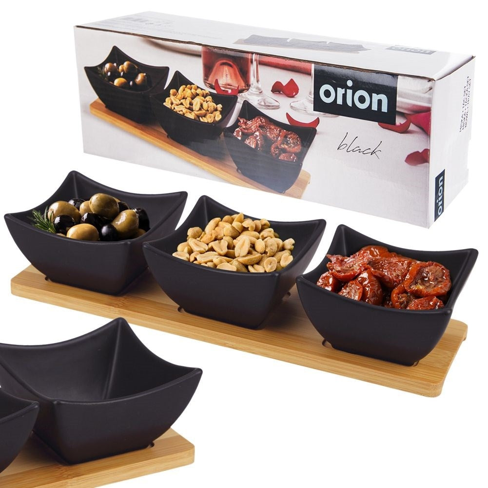 Set of 3 black porcelain bowls on bamboo tray for serving