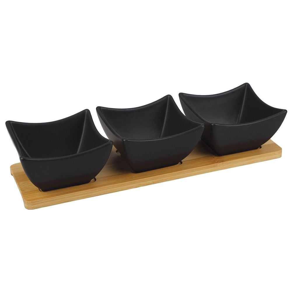 Set of 3 black porcelain bowls on bamboo tray for serving