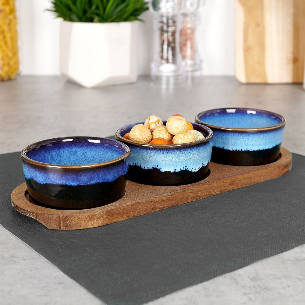 Set of 3 ceramic bowls on acacia tray for snacks and dips