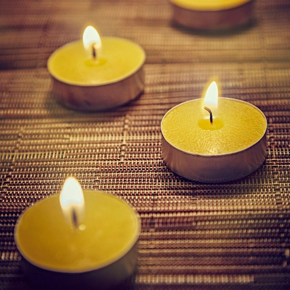 Set of 40 tealights with essential oil and lemon scent