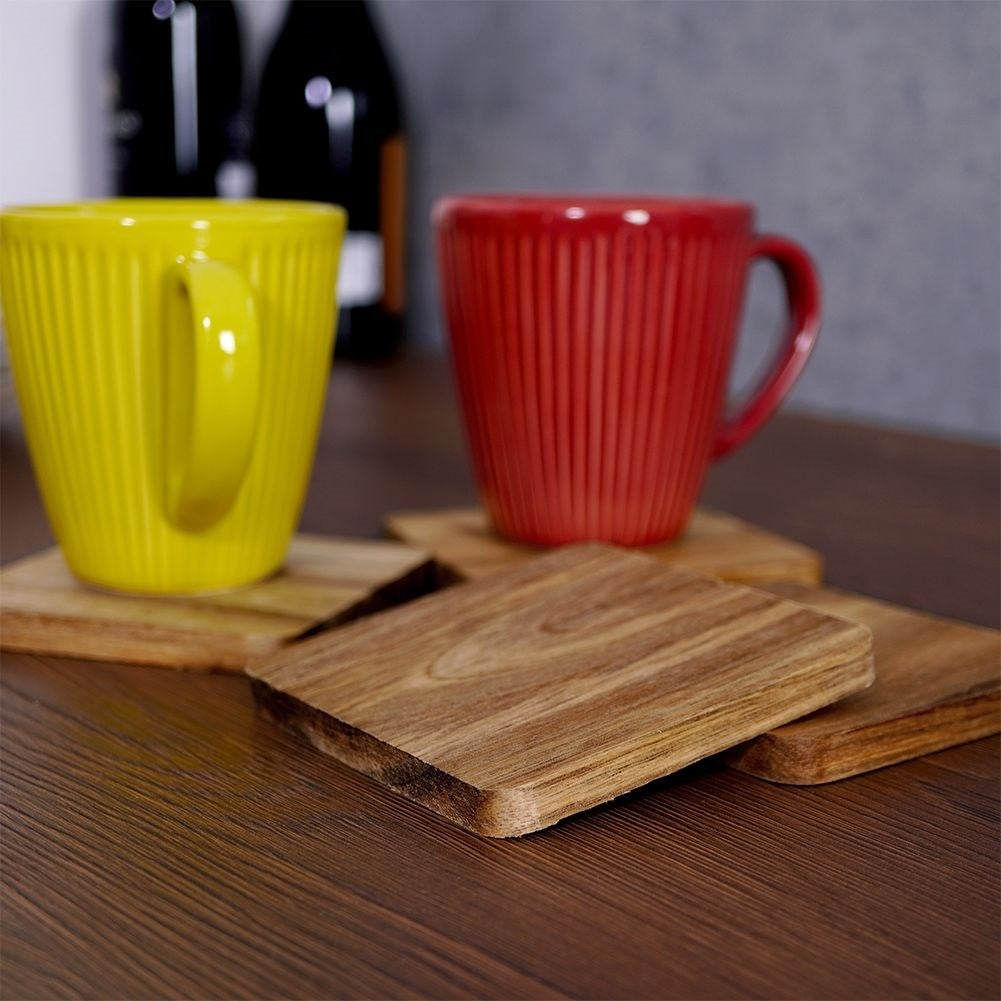 Set of 4 coasters for hot dishes - natural wood