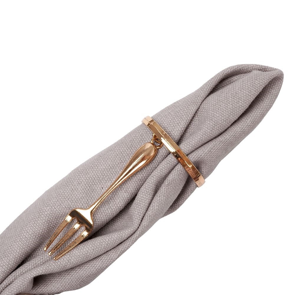 Set of 4 elegant napkin rings in gold, luxurious table setting