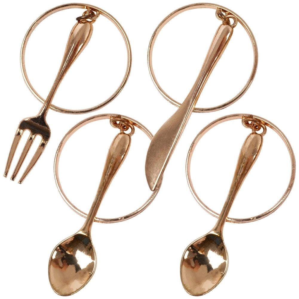 Set of 4 elegant napkin rings in gold, luxurious table setting