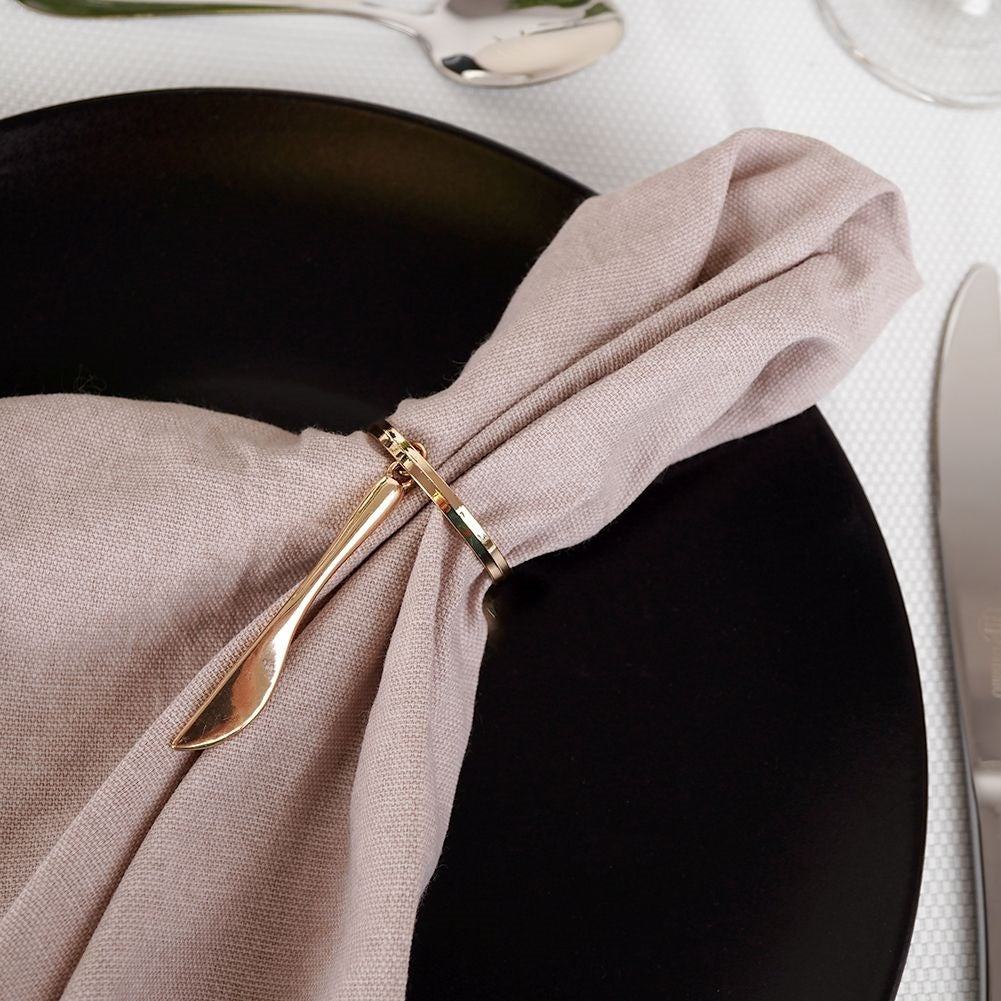 Set of 4 elegant napkin rings in gold, luxurious table setting