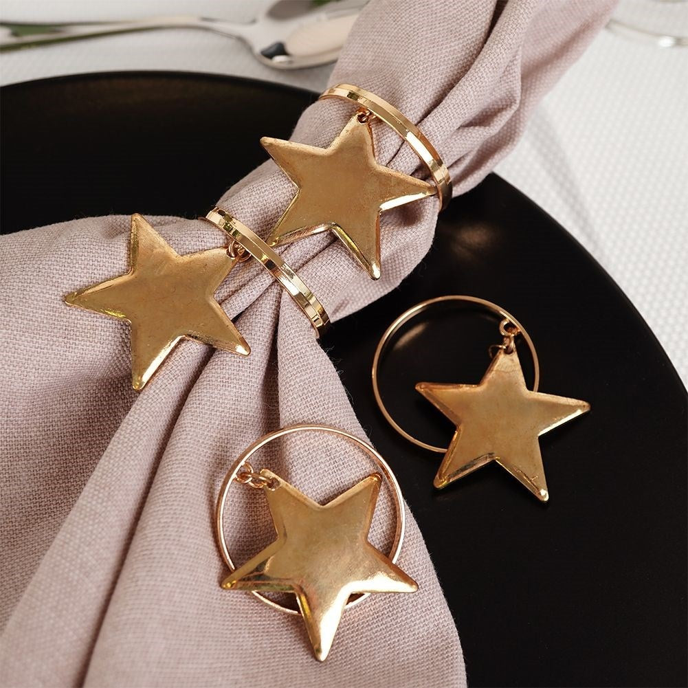 Set of 4 gold napkin rings with stars, 4 cm diameter