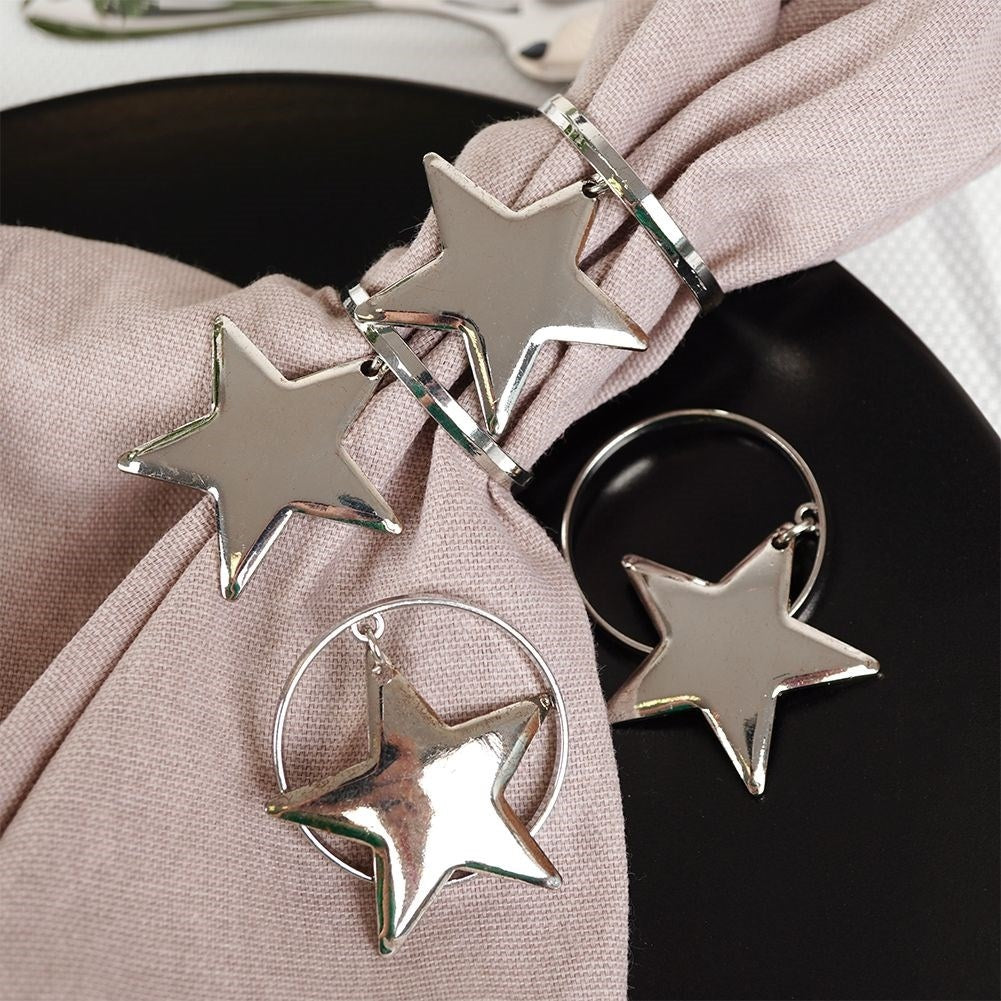 Set of 4 napkin rings in silver with star decoration