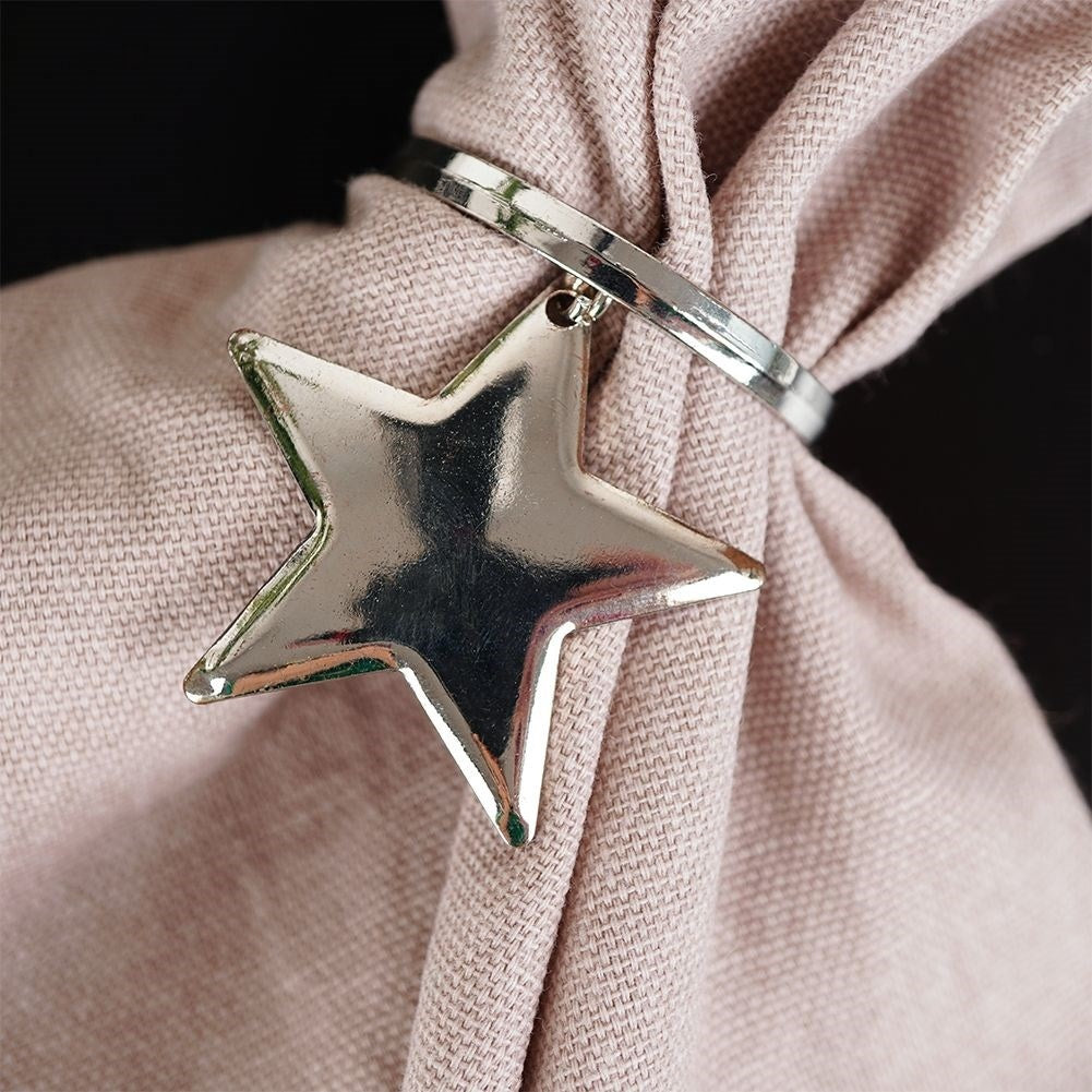 Set of 4 napkin rings in silver with star decoration