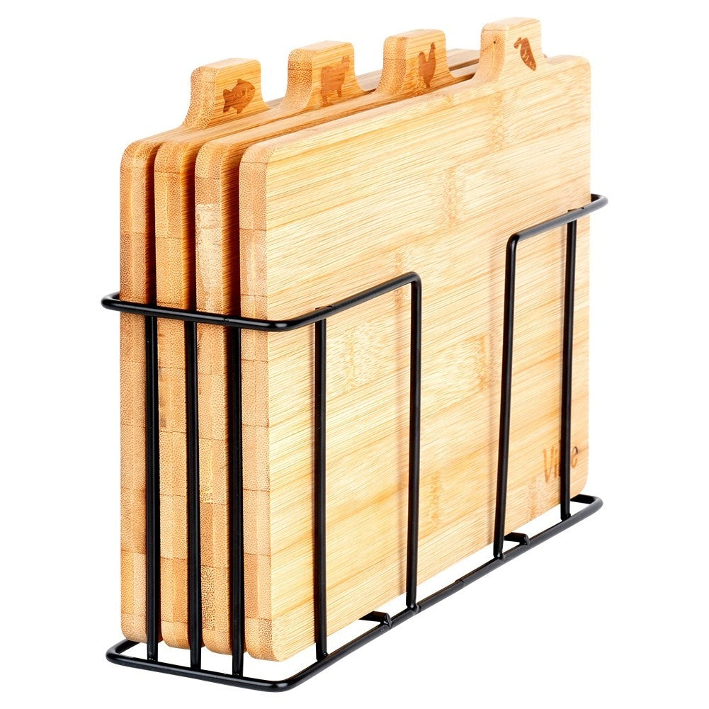 Set of bamboo cutting boards in a metal stand with a unique design