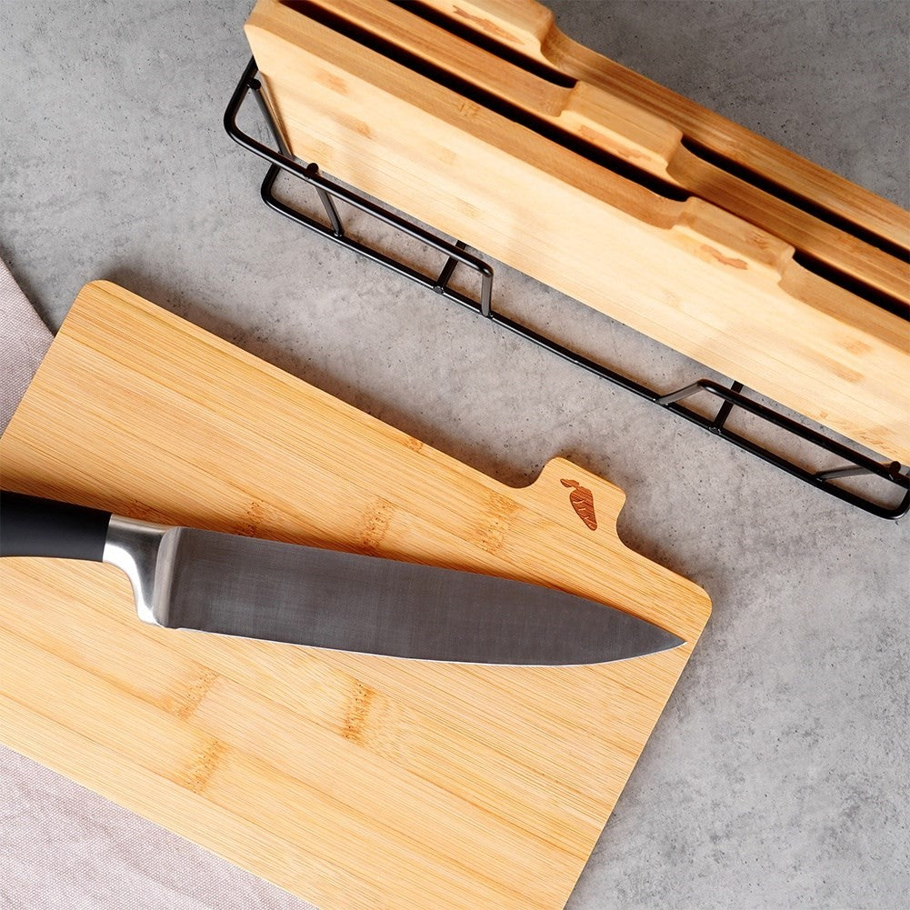 Set of bamboo cutting boards in a metal stand with a unique design