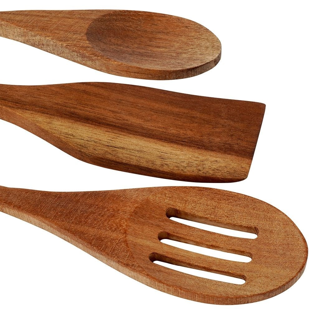 Set of kitchen utensils in acacia wood: all-round spoon, slotted spoon, universal spoon