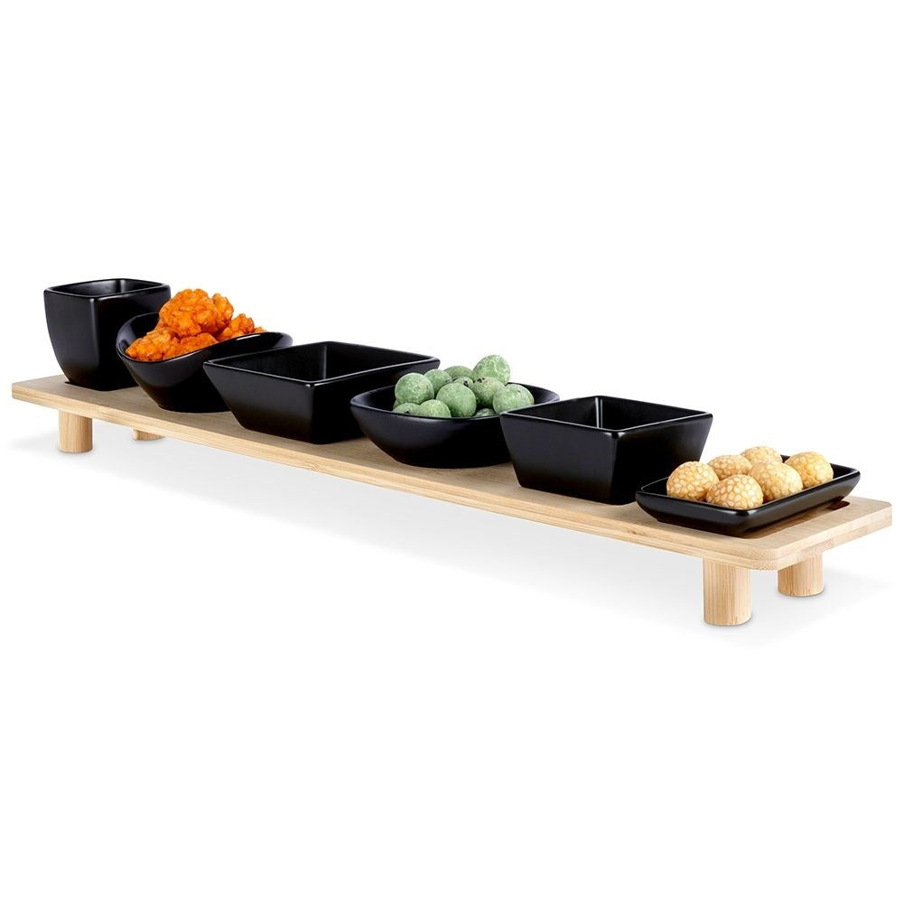 Set of six bowls on a bamboo tray for snacks and dips