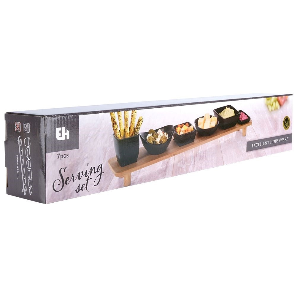 Set of six bowls on a bamboo tray for snacks and dips