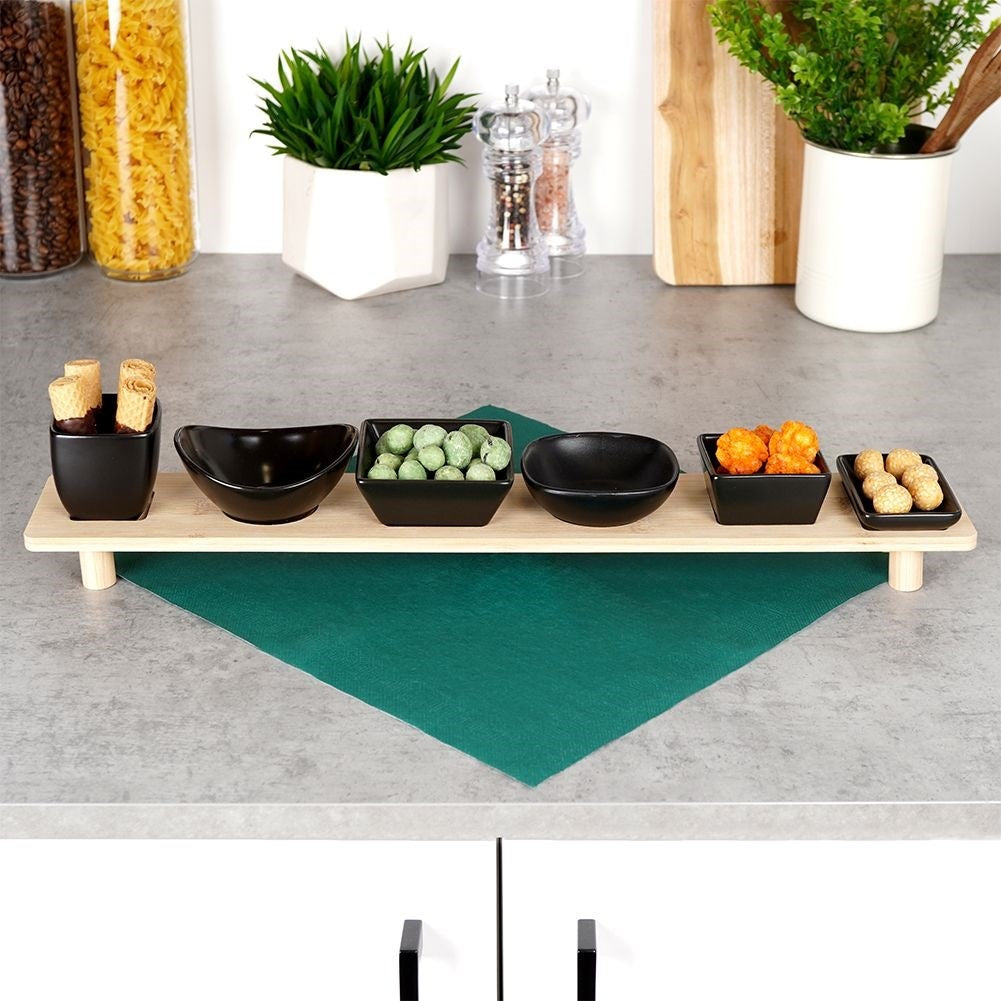 Set of six bowls on a bamboo tray for snacks and dips