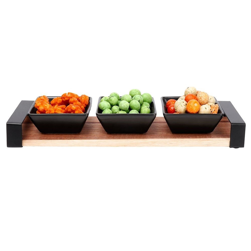 Set of three bowls on acacia tray for snacks and sauces