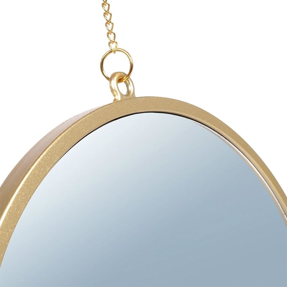 Set of three elegant wall mirrors with golden frames