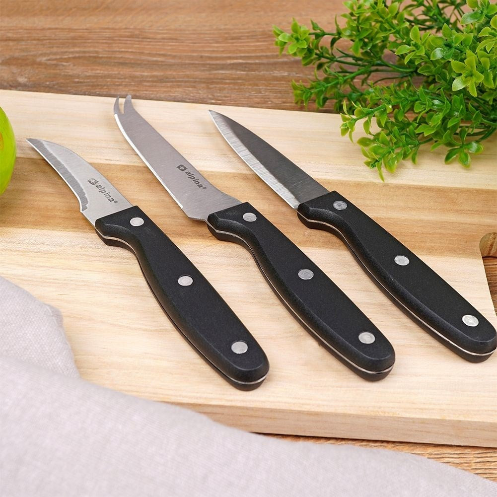 Set of three kitchen knives: peeler, cheese knife, all-round knife