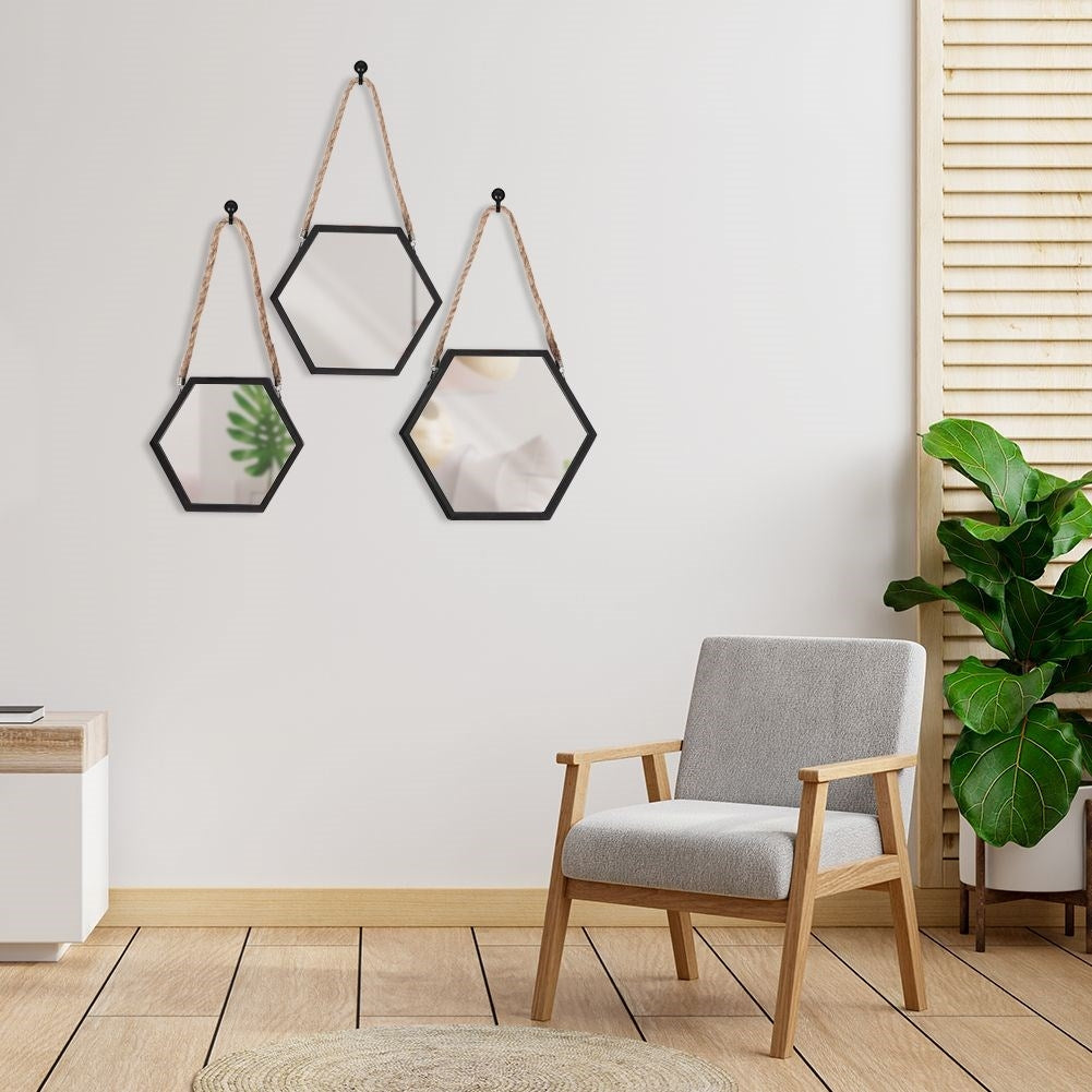 Set of three stylish hexagon mirrors with black frame