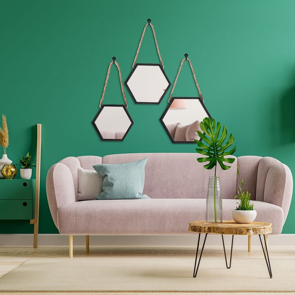 Set of three stylish hexagon mirrors with black frame