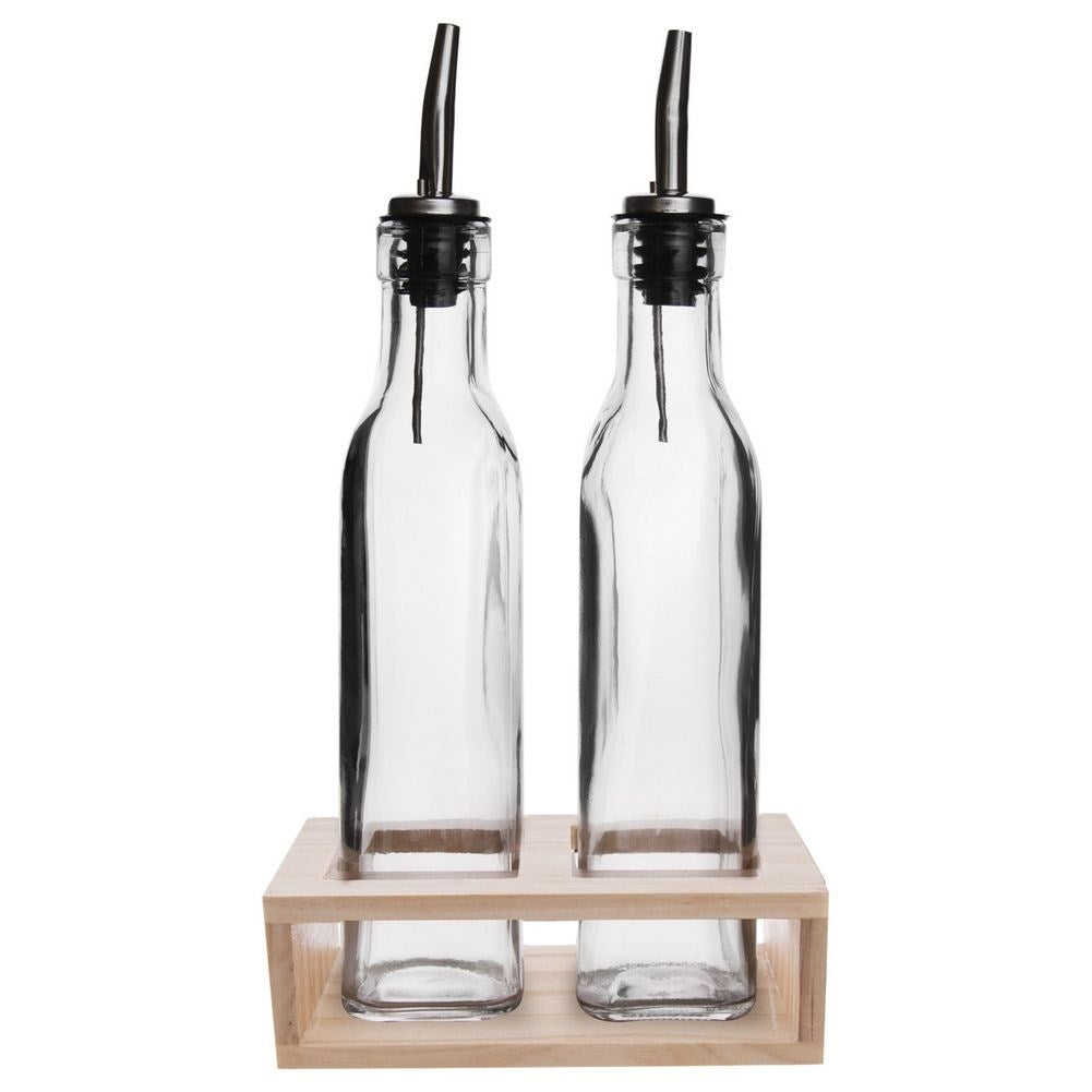 Set of two glass bottles with dispenser in wooden stand