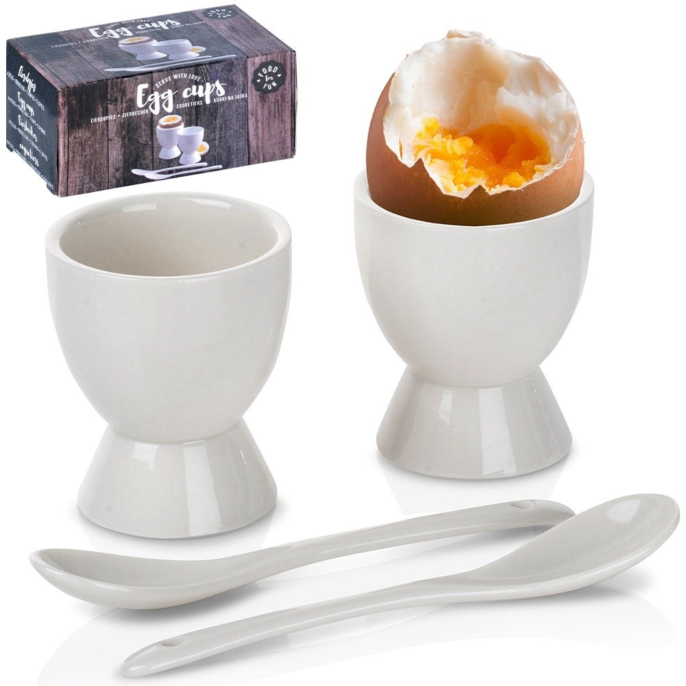 Set of two white porcelain egg cups with spoons