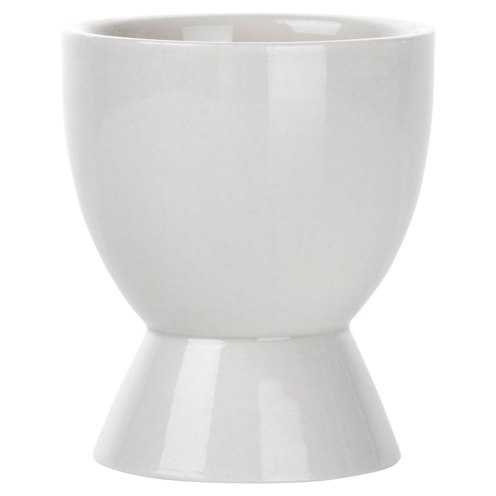 Set of two white porcelain egg cups with spoons